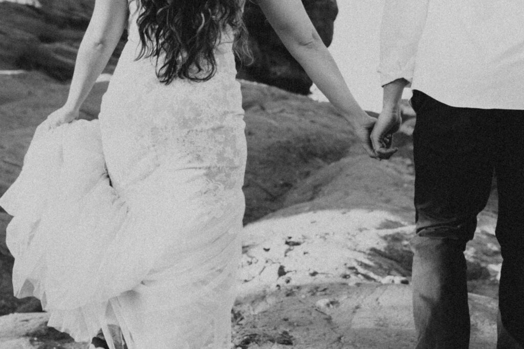 holding hands in the colorado red rocks
