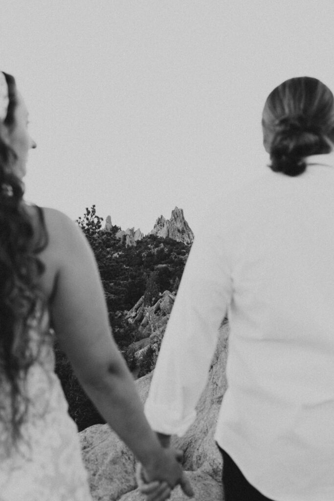 holding hands red rocks colorado elopement