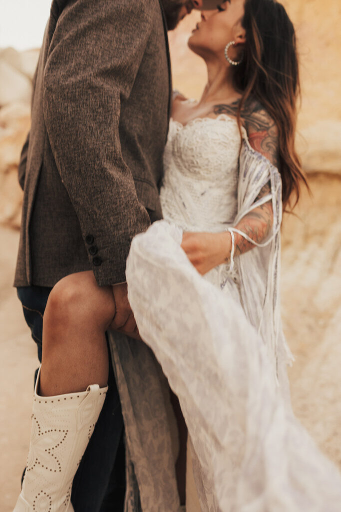 close up shot of the bride and groom kissing during their beautiful boho elopement