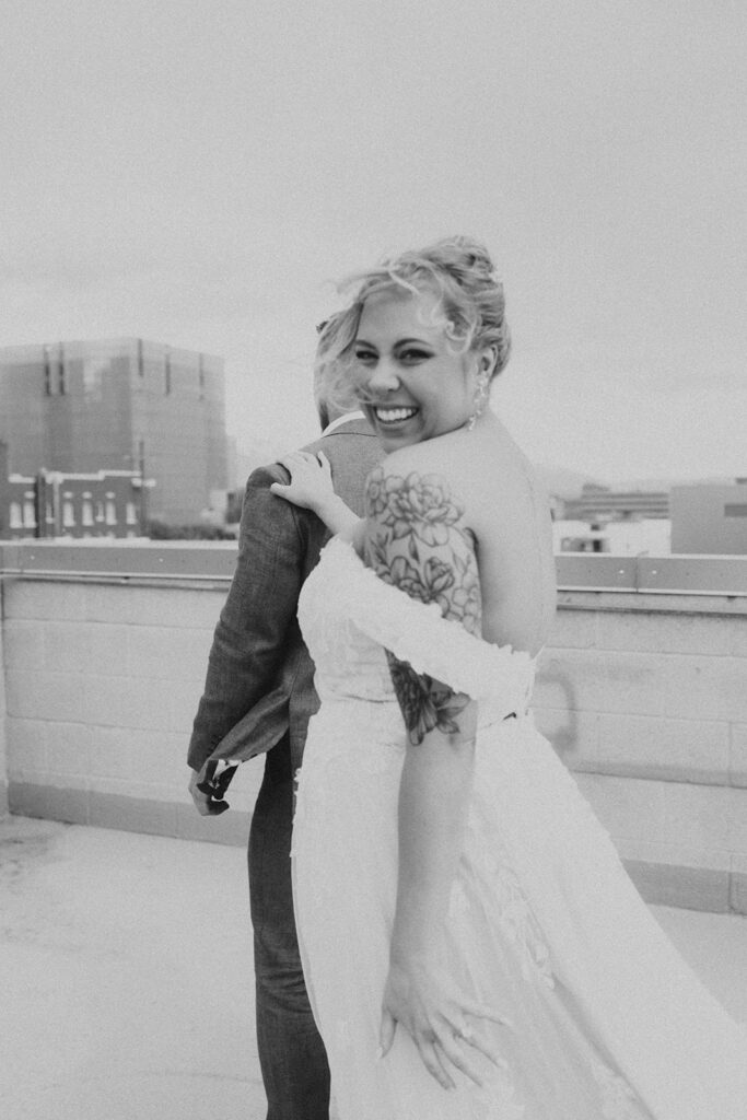 bride and groom doing a first look on a rooftop in salt lake city