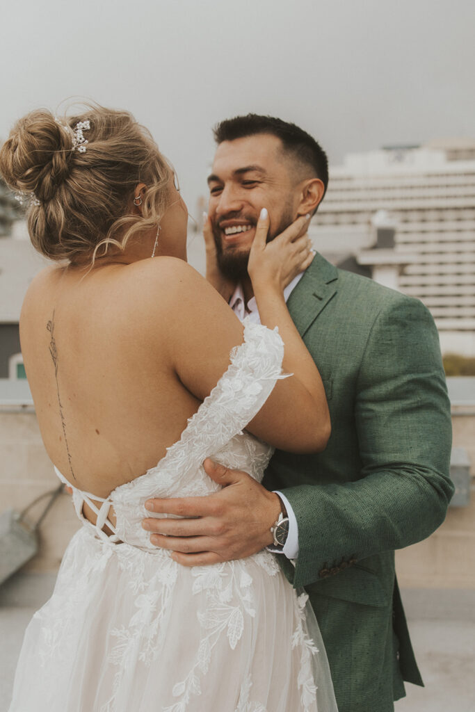 bride and groom doing a first look on a rooftop in salt lake city