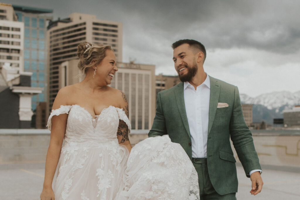 bride and groom posing for a first look photoshoot