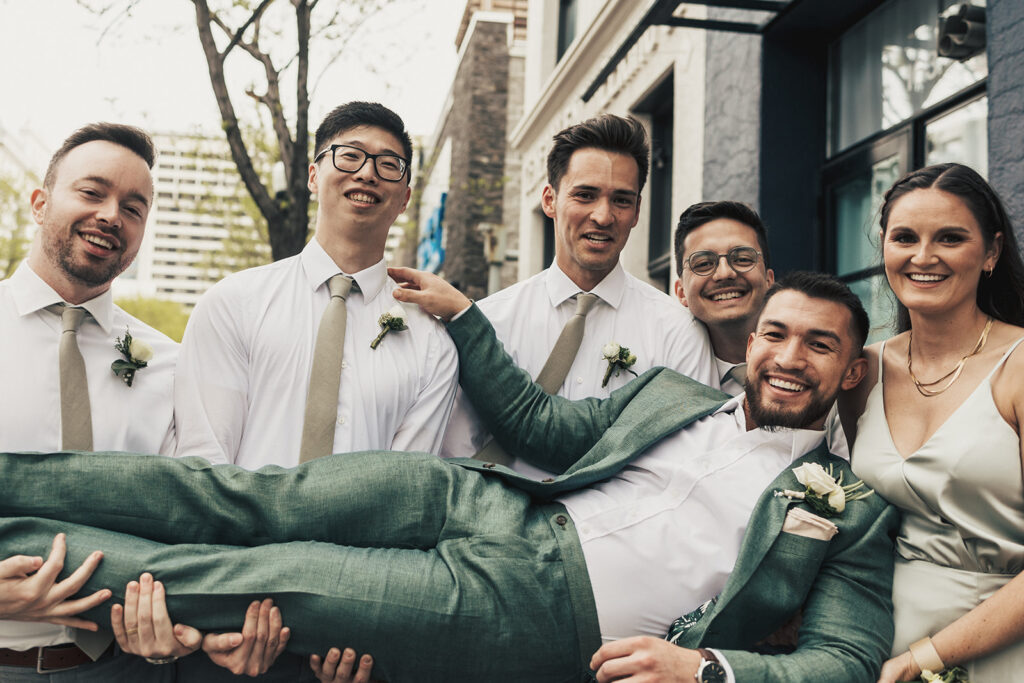 bridal party posing for the wedding pictures