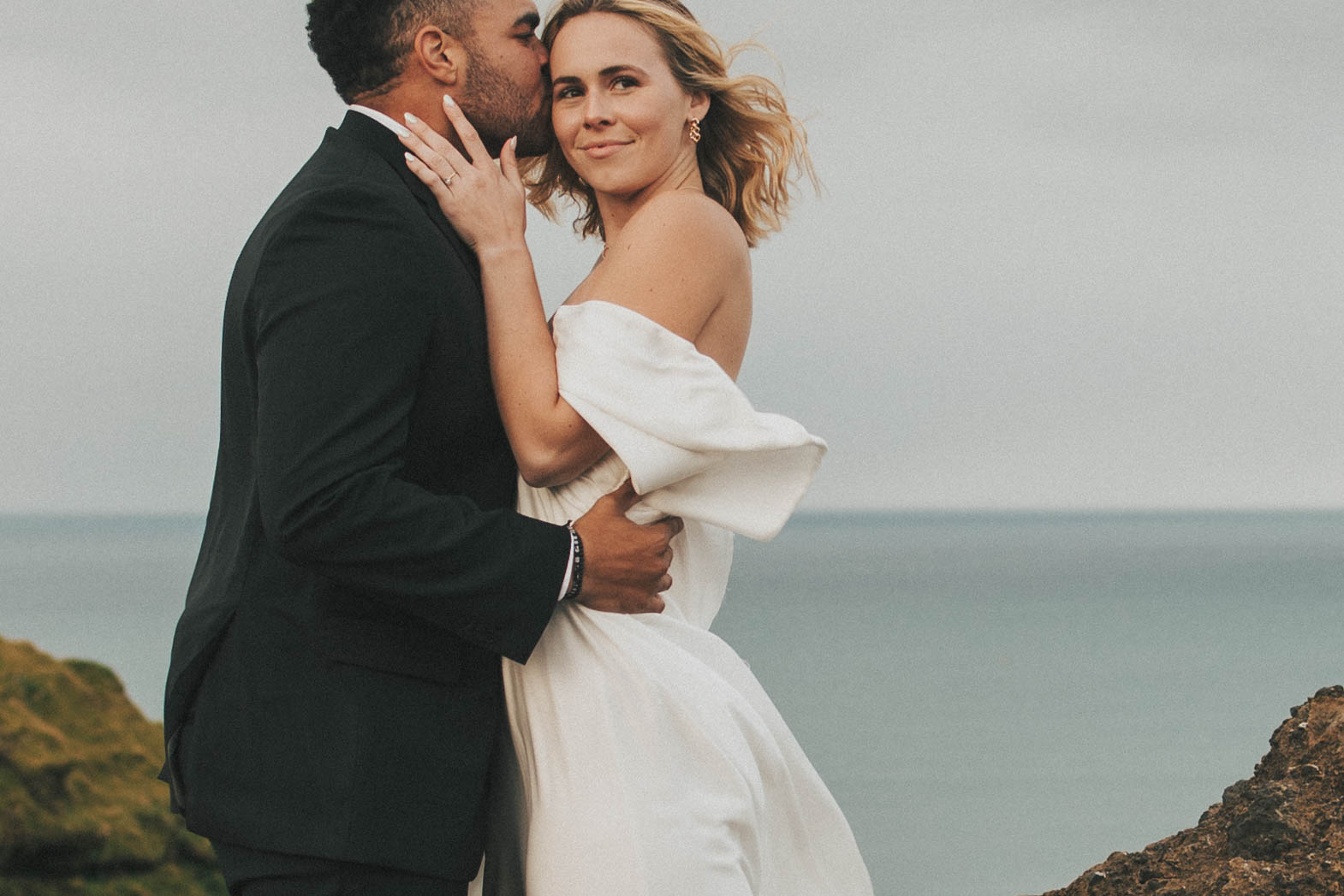 couple posing for their elopement photos in iceland