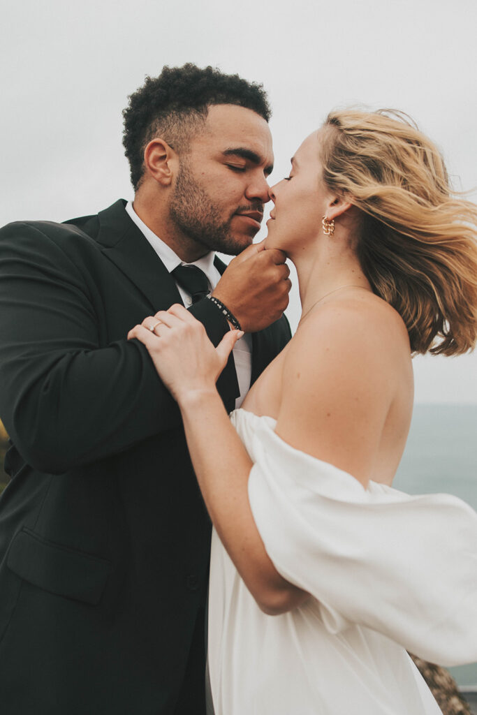 couple having an adventure wedding on a beach in iceland
