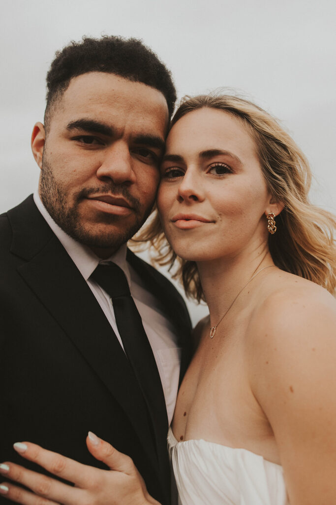 couple posing for their elopement photos in iceland
