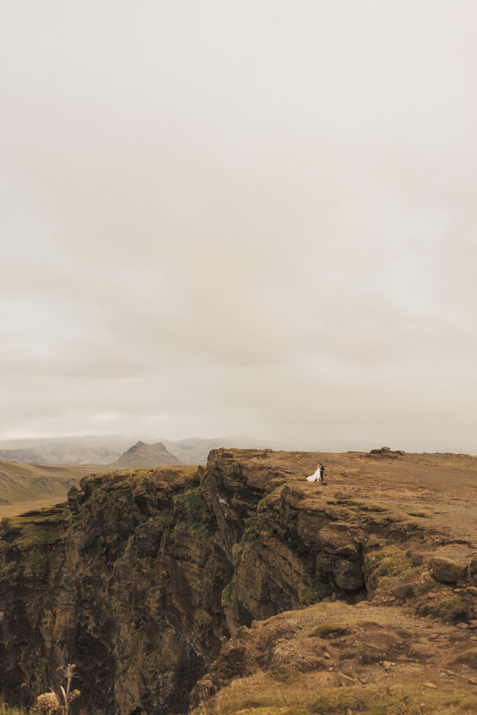 couple posing for their elopement photos in iceland