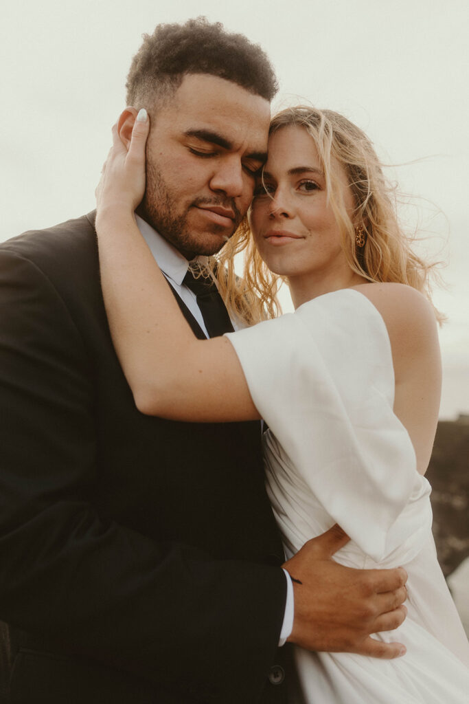 couple having an adventure wedding on a beach in iceland
