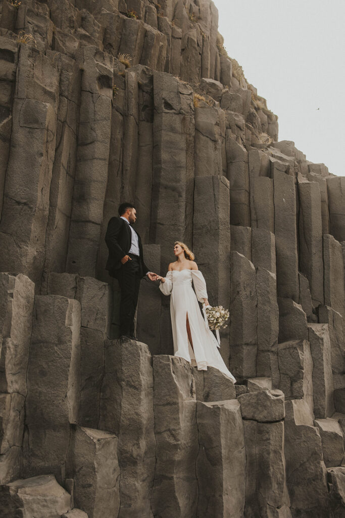 couple posing for their elopement photos in iceland
