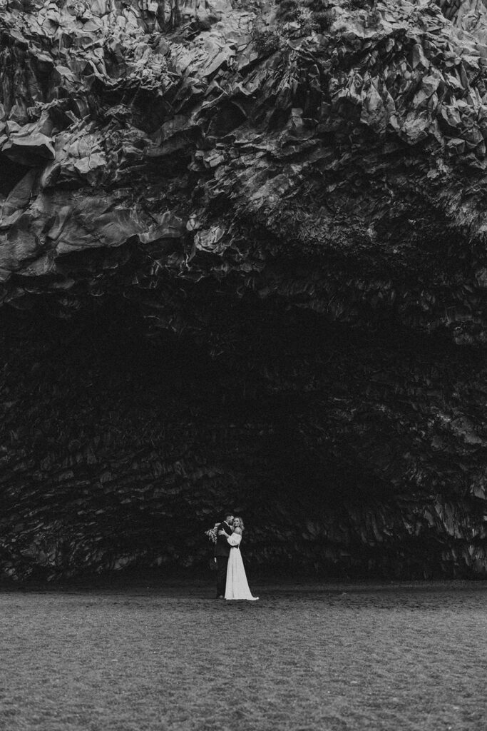 couple having an adventure wedding on a beach in iceland
