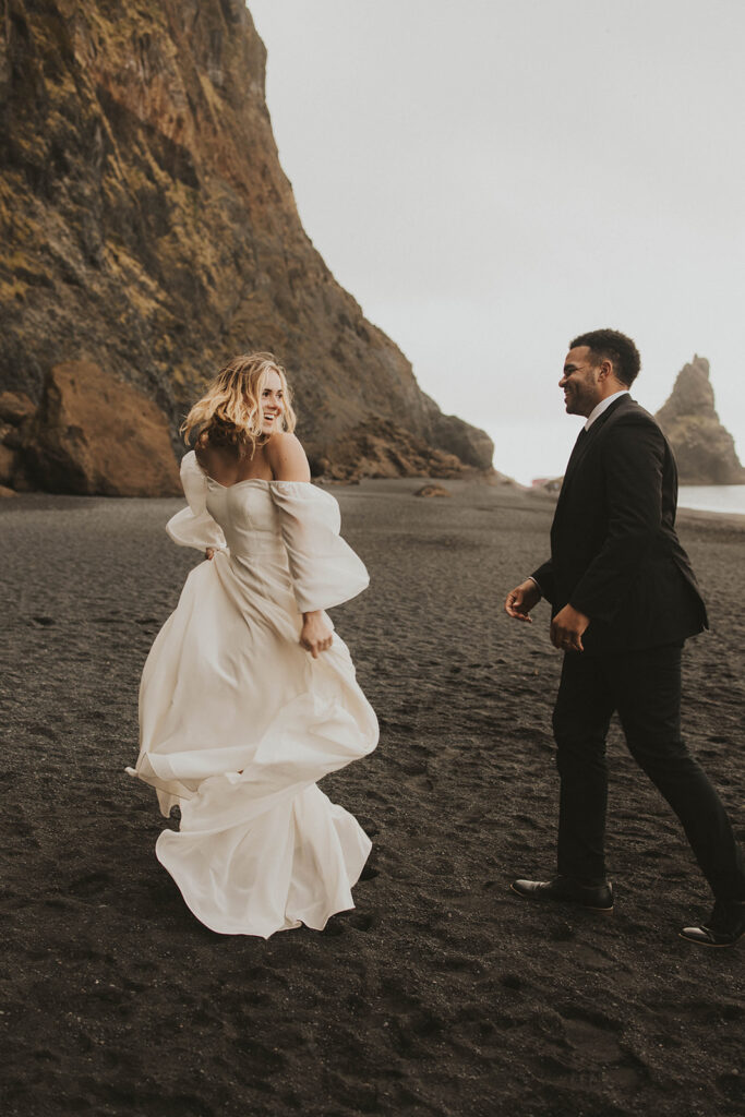 couple posing for their elopement photos in iceland
