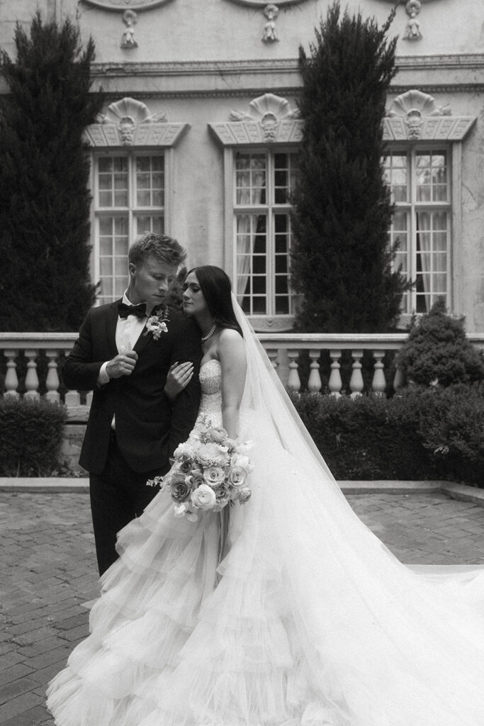 couple posing for their wedding portraits - la caille in utah
