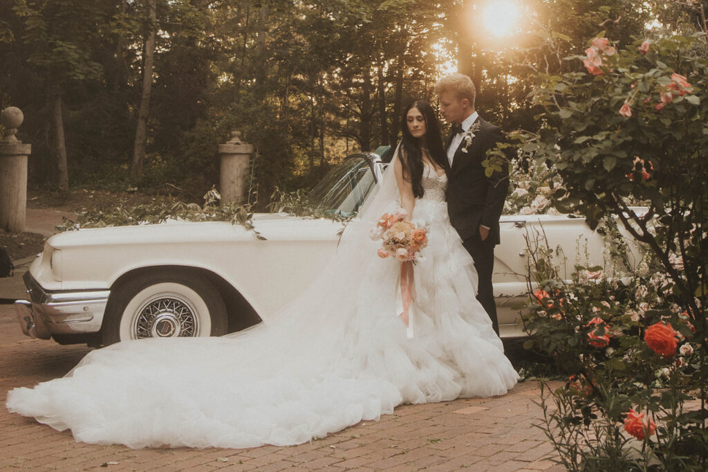 bride and groom posing in utah at la caille for their wedding portraits