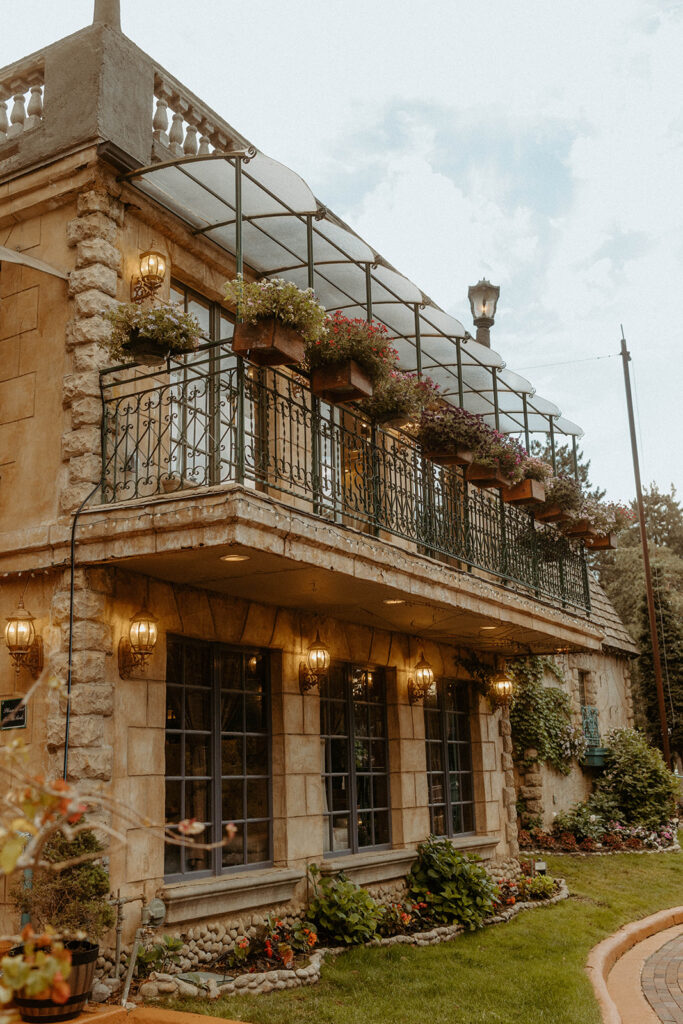 bride and groom posing in utah at la caille for their wedding portraits