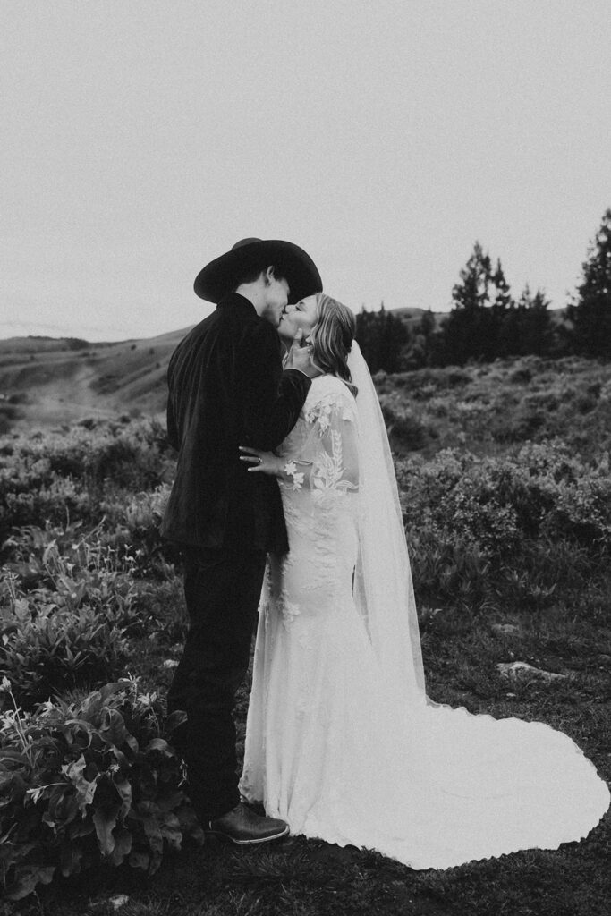 couple posing for their elopement photos in grand teton national park
