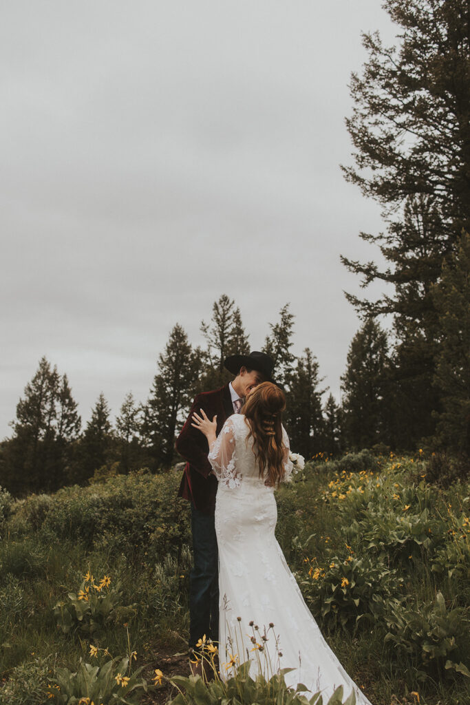 couple posing for their elopement photos in grand teton national park
