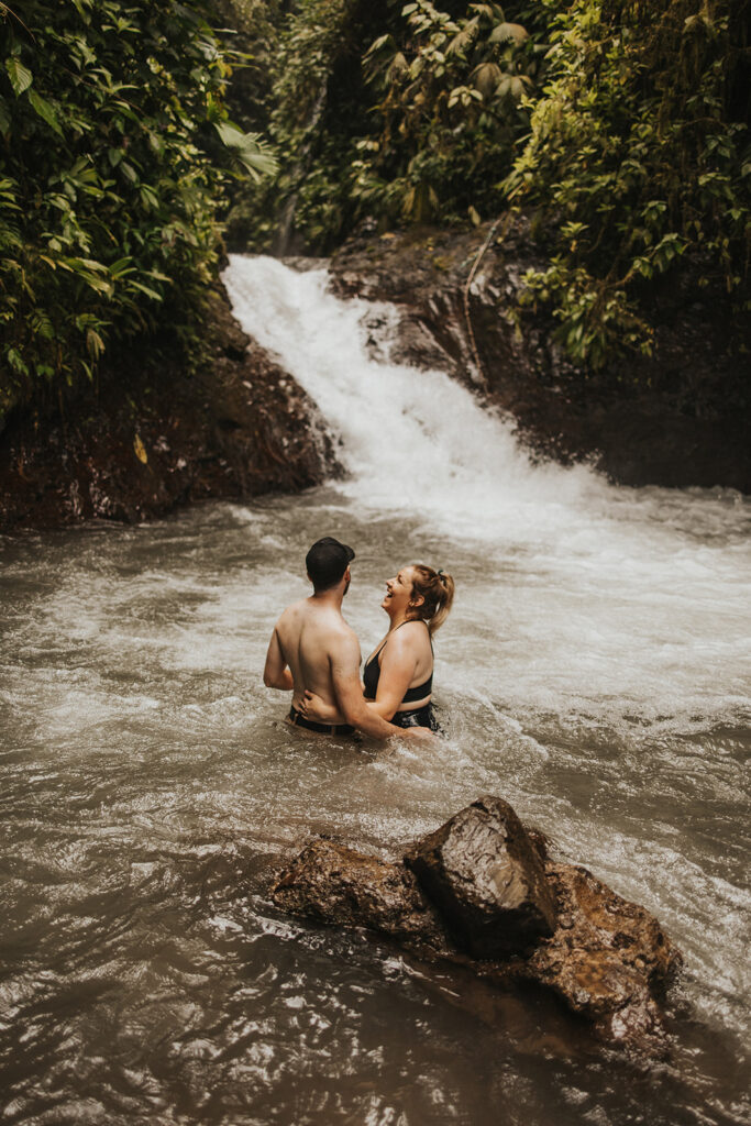 couple posing on the beach in costa rica