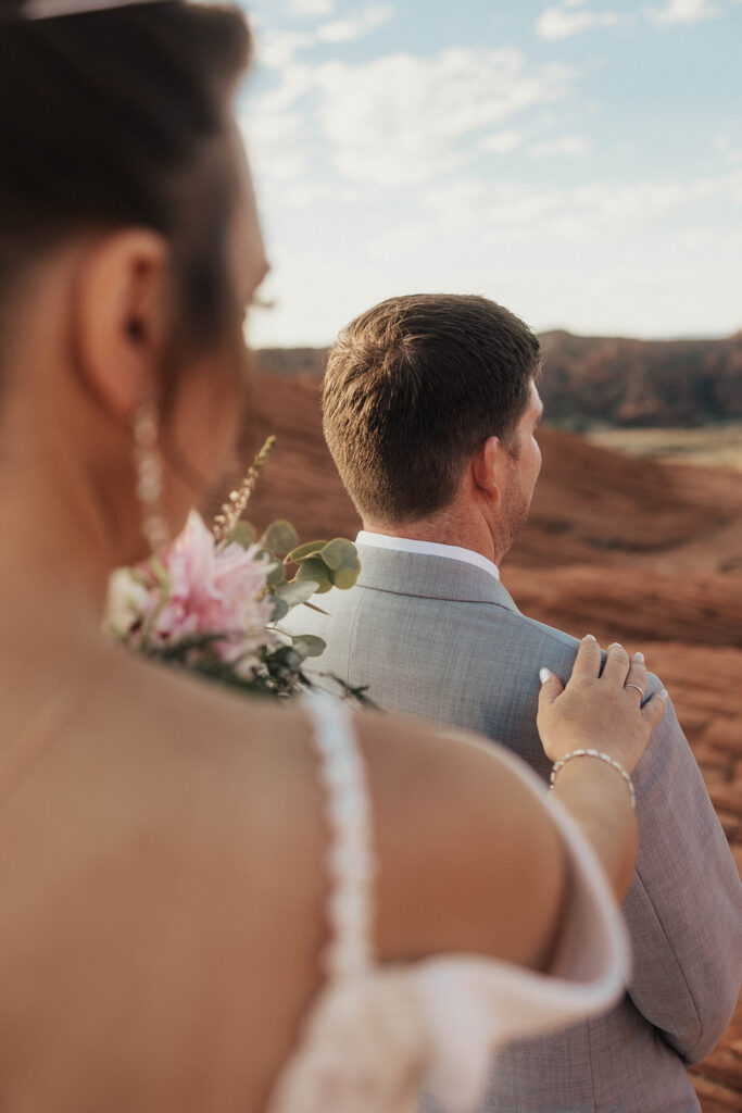 bride and groom in utah posing for their adventure wedding photos
