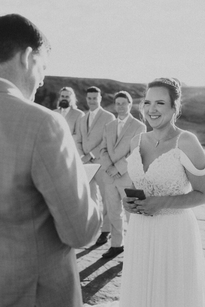 Couple posing for their wedding photos at snow canyon state park

