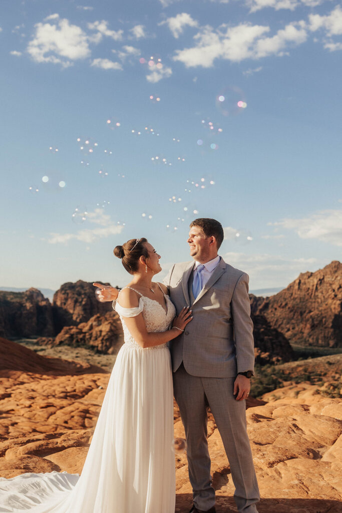 bride and groom in utah posing for their adventure wedding photos
