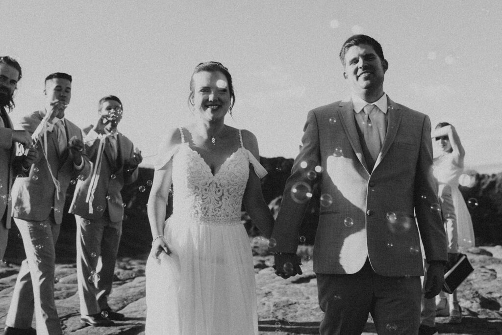 newlyweds posing in utah for their wedding photos

