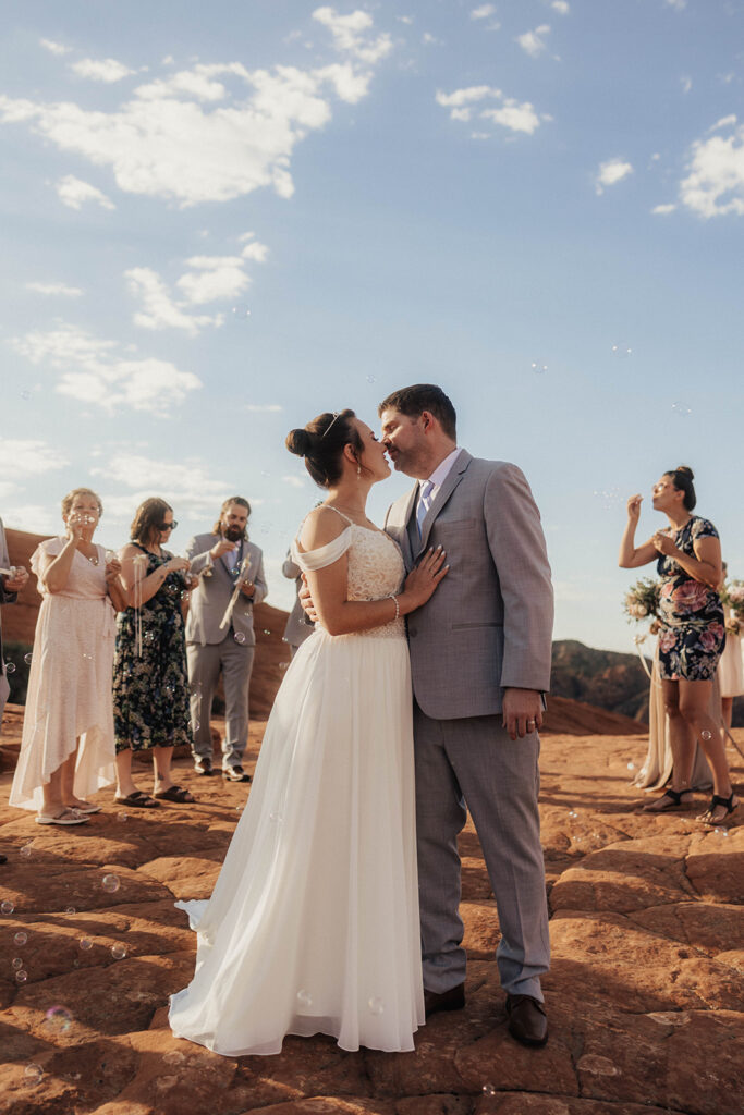 bride and groom in utah posing for their adventure wedding photos
