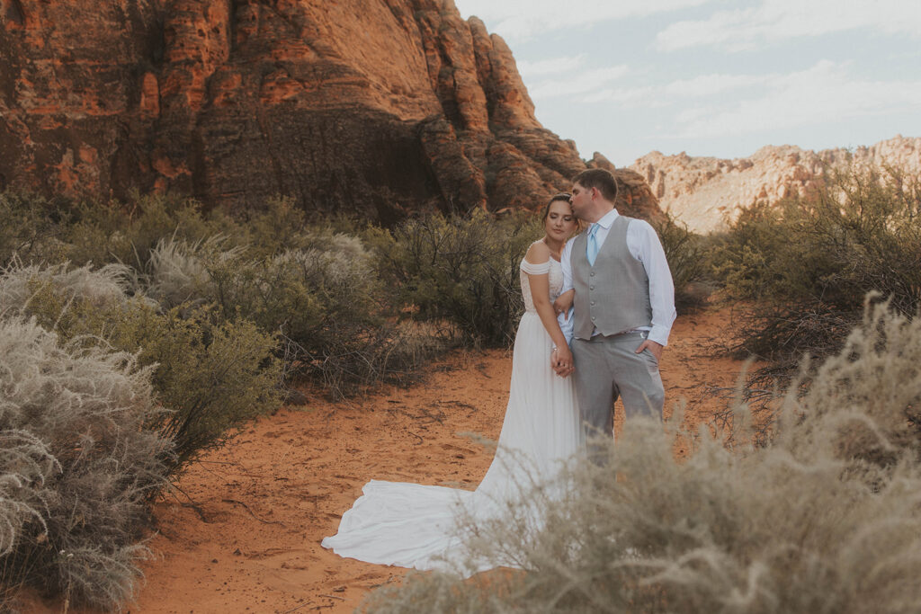 bride and groom in utah posing for their adventure wedding photos
