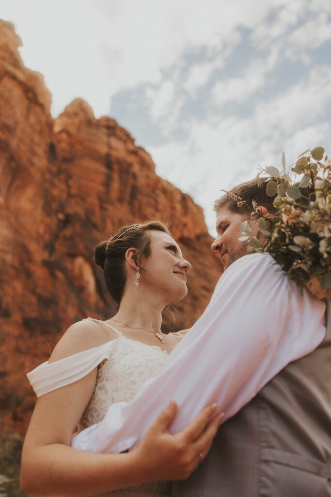 newlyweds posing in utah for their elopement photos
