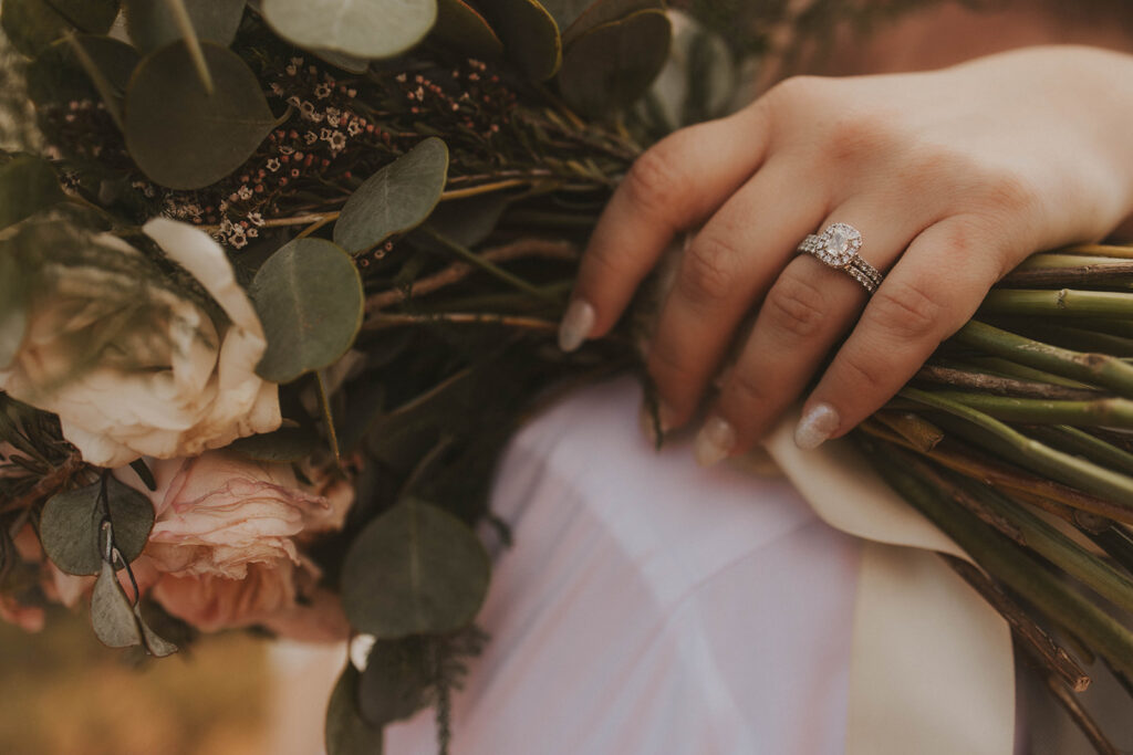bride and groom in utah posing for their adventure wedding photos
