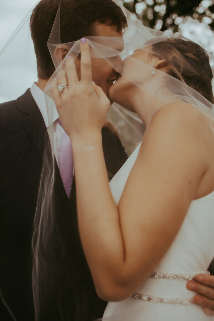 newlyweds posing for wedding photos