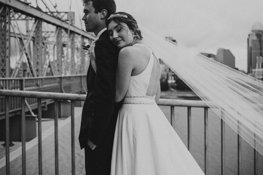newlyweds posing for wedding photos
