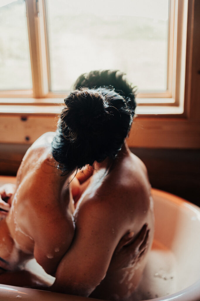 couple having a steamy photoshoot in wyoming
