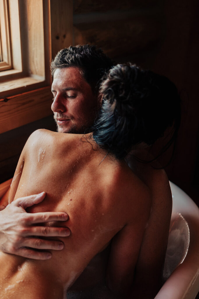 couple having a steamy photoshoot in wyoming
