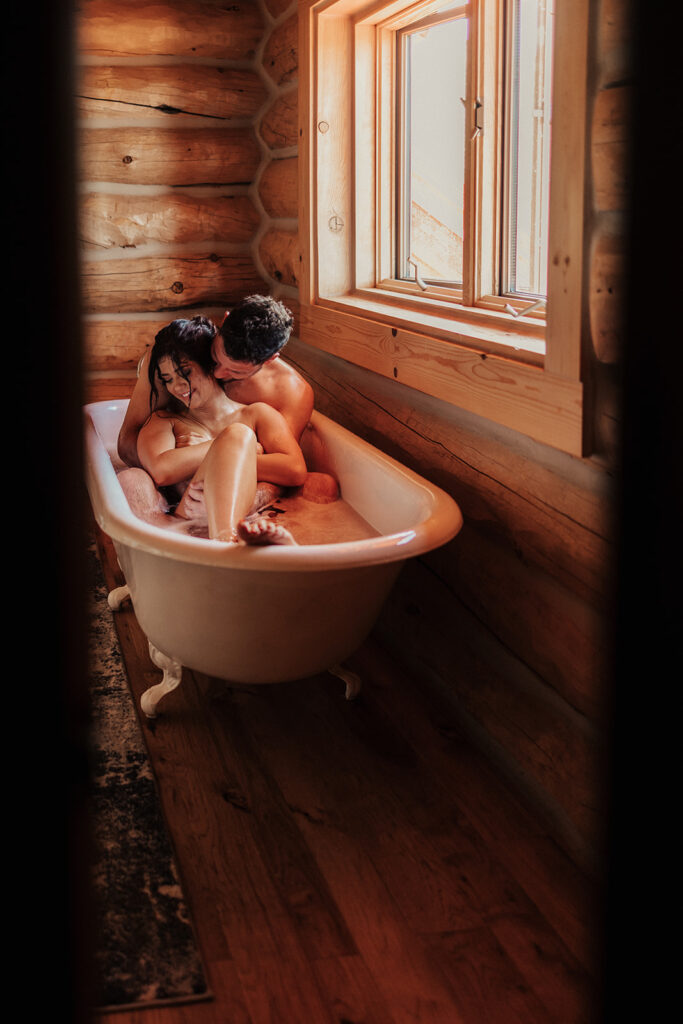couple having a steamy photoshoot in wyoming
