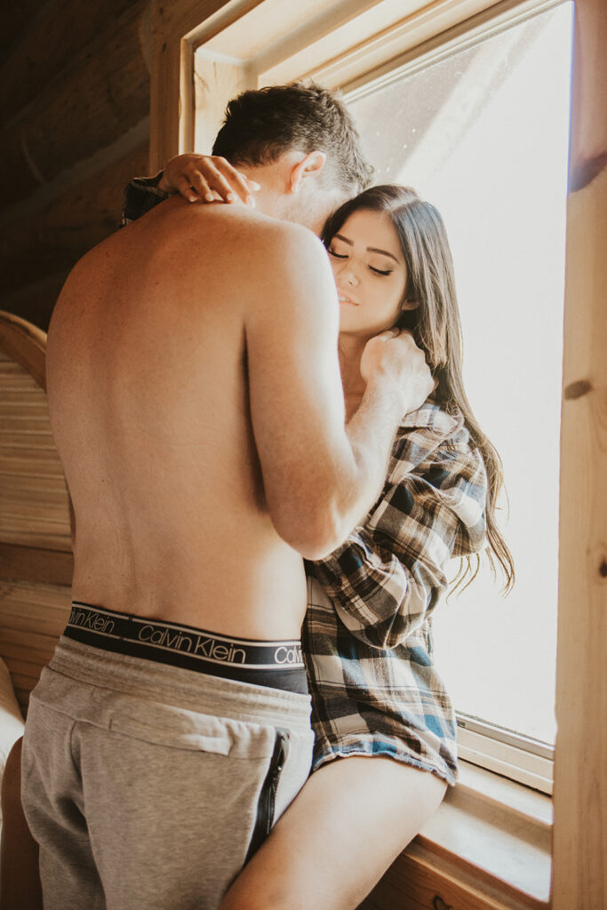 couple photoshoot at home at a cozy and intimate cabin in Jackson, WY