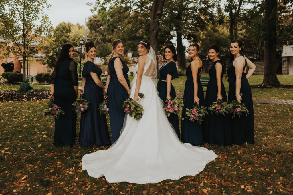 wedding party bridesmaids posing