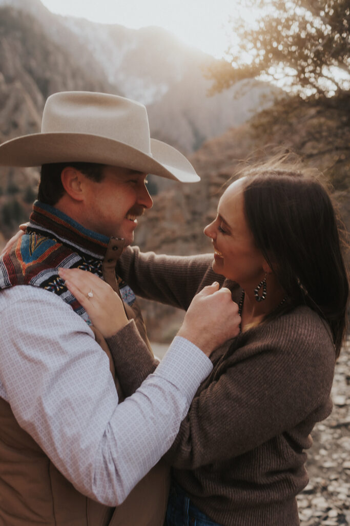 stunning couple looking at each other during their engagement session 