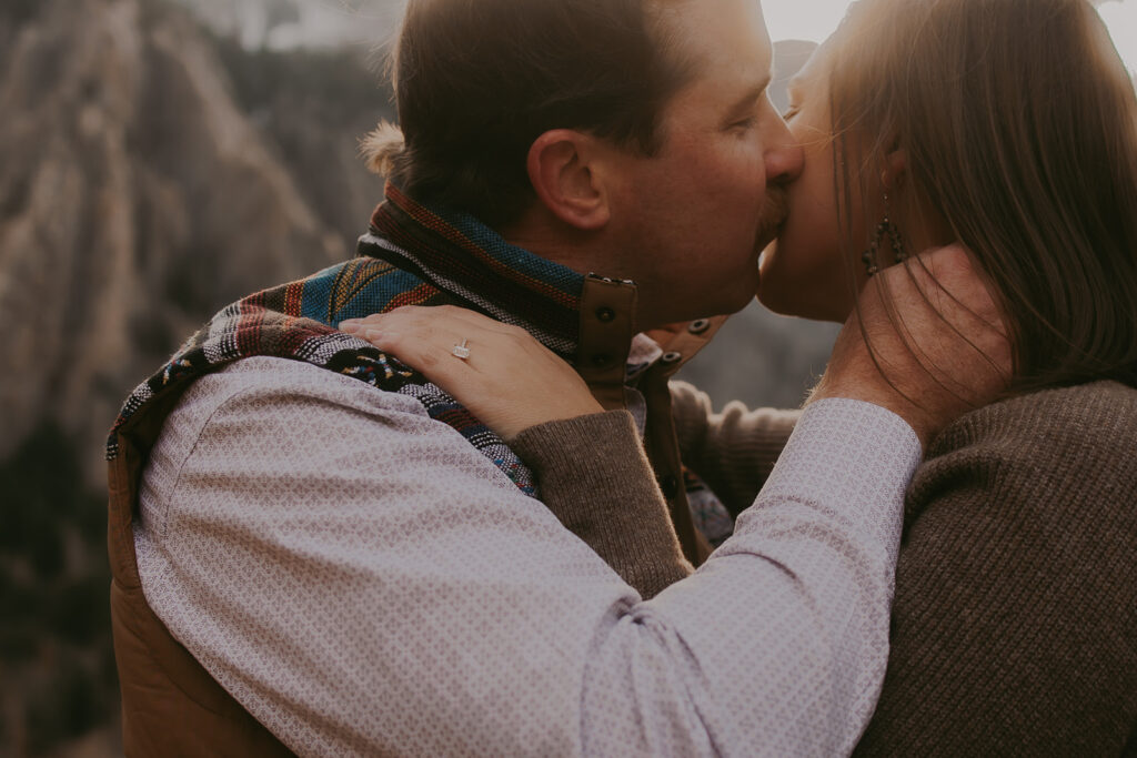fiance kissing her fiance on the cheek
