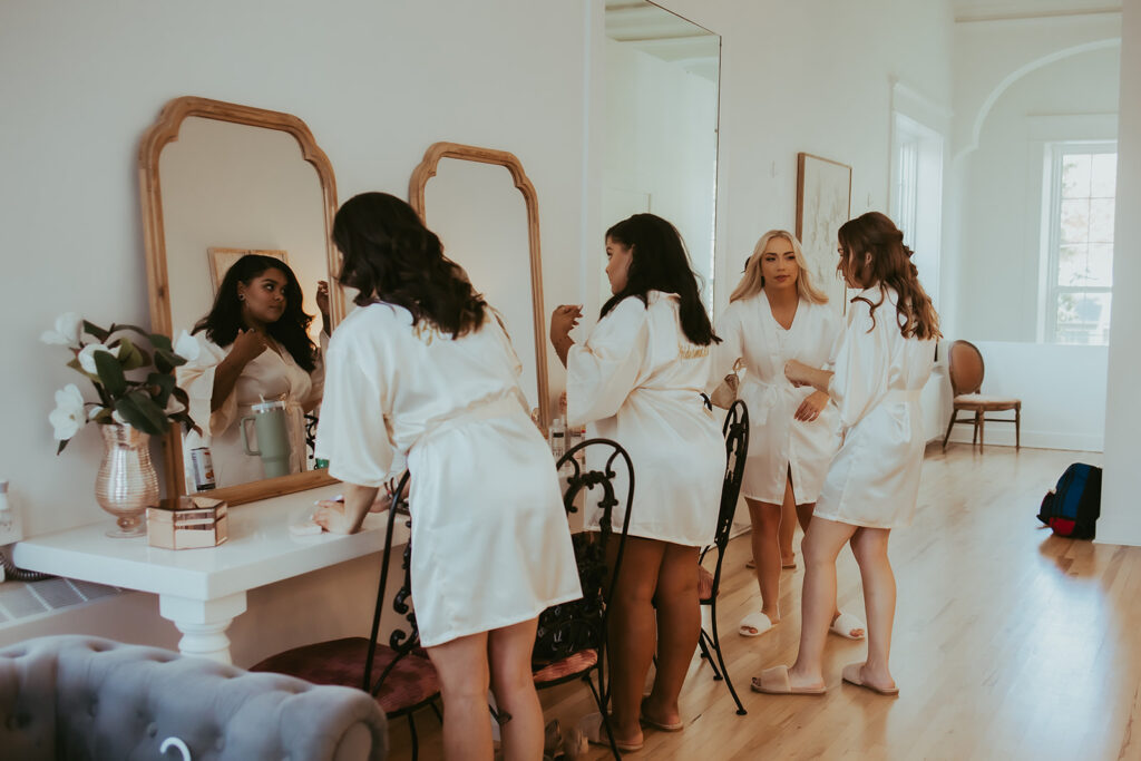Bride and Bridesmaids getting ready before the ceremony
