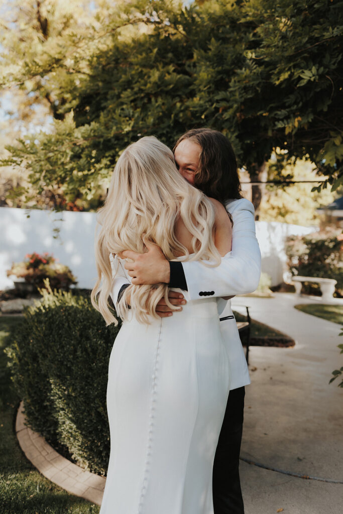 Bride and Groom emotional after their first look at their intimate wedding at La Capella