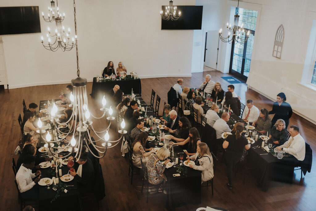 Bride and Groom with at their reception dinner with their guest's