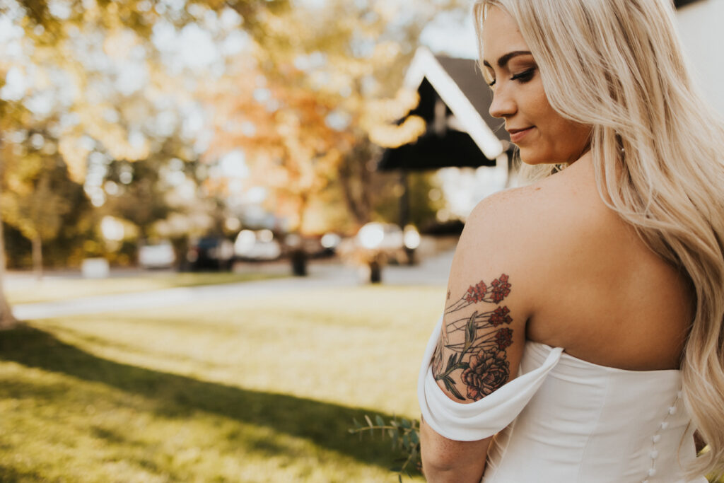 a moment for the bride in front of the venue