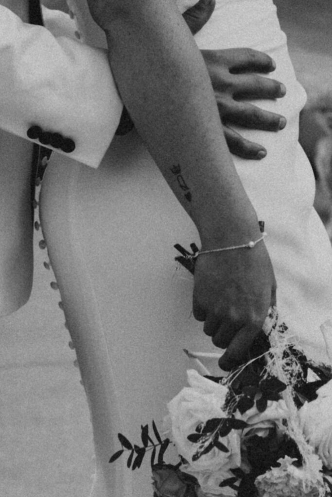 detail tattoo bride and groom shot