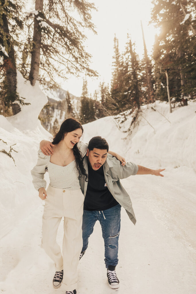 couple running during their engagement session