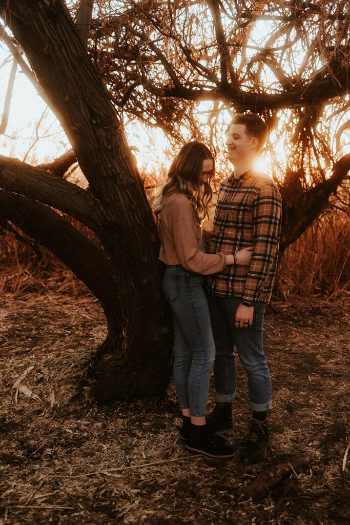 couple playing during their engagement session 