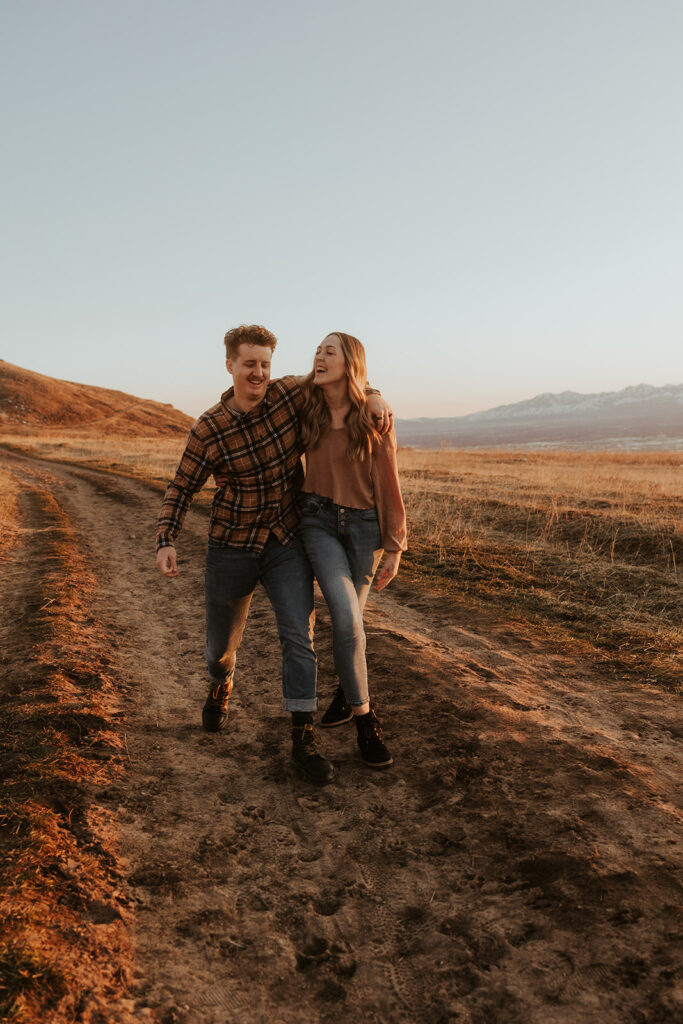 engaged couple having a good time during their photoshoot