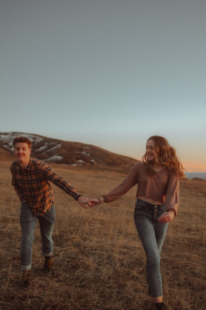couple playing during their engagement session