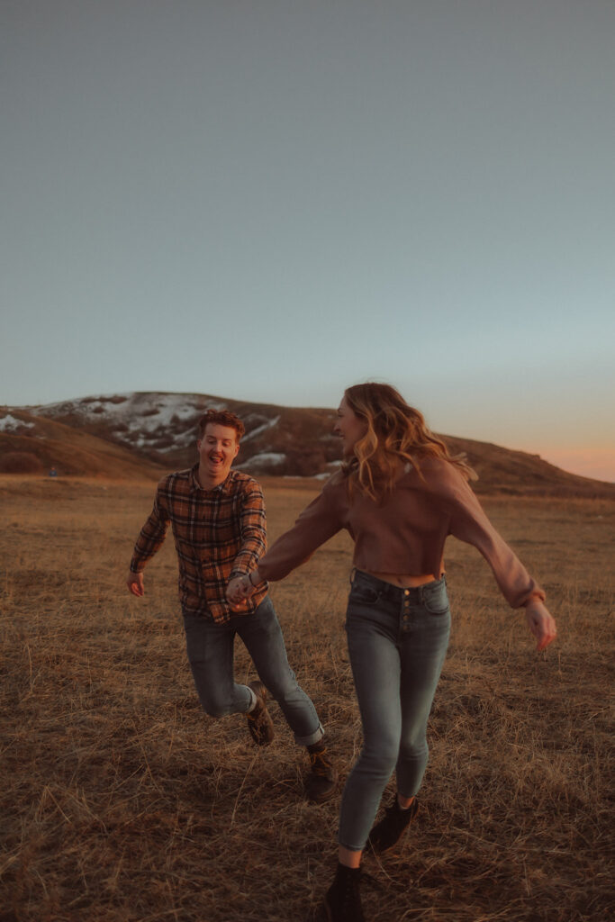 couple running at tunnel springs park, UT 