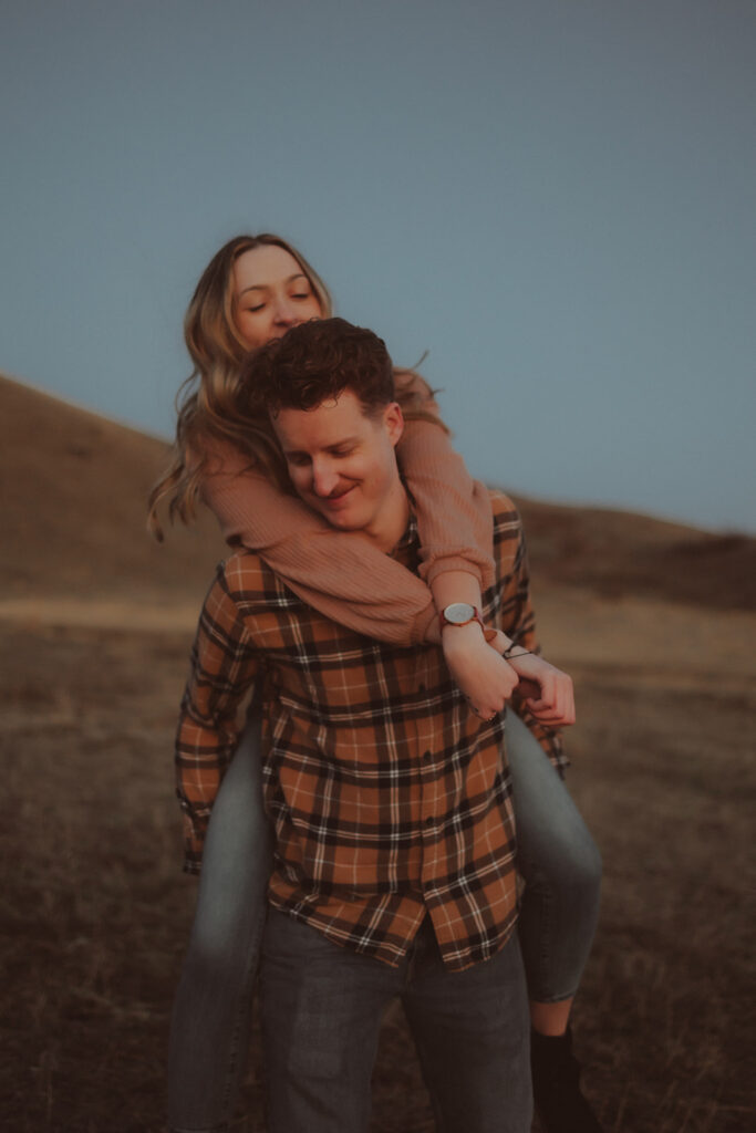 couple playing during their engagement session