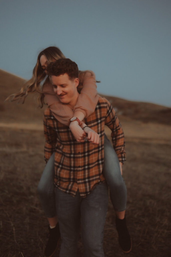 couple laughing during their engagement session 